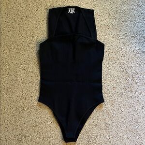 OQQ Black ribbed bodysuit